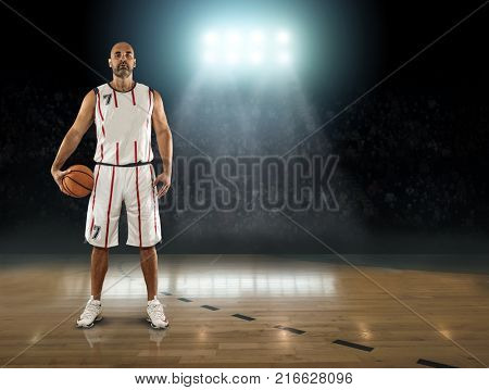 Caucassian Basketball Player in dynamic action with ball in a professional sport game