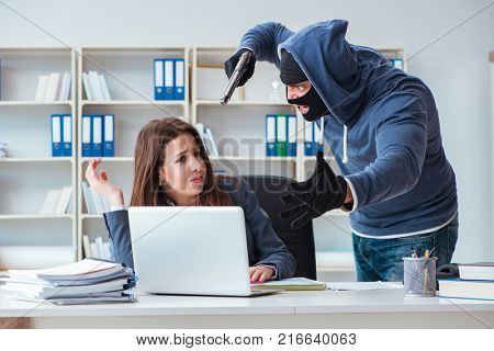 Criminal taking businesswoman as hostage in office