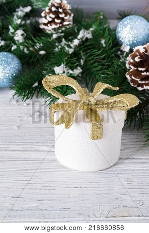 festive beautiful christmas background with gift boxes balls and christmas tree branches on white wooden background copy space