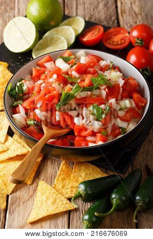 Pieces Of Chicken Stew With Potatoes, Peppers, Tomatoes, Peas And Onions Close-up. Vertical Top View