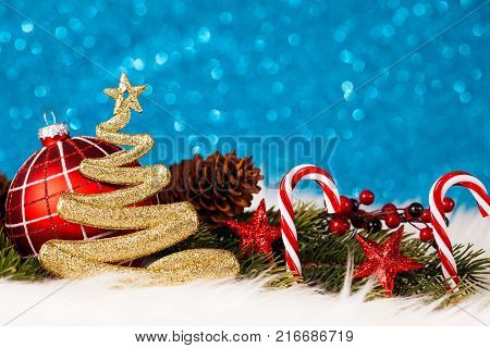 Christmas Tree - Blue Glitter sparkling In The Red Background