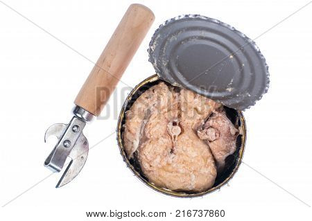 Open metal jar with canned fish. Studio Photo