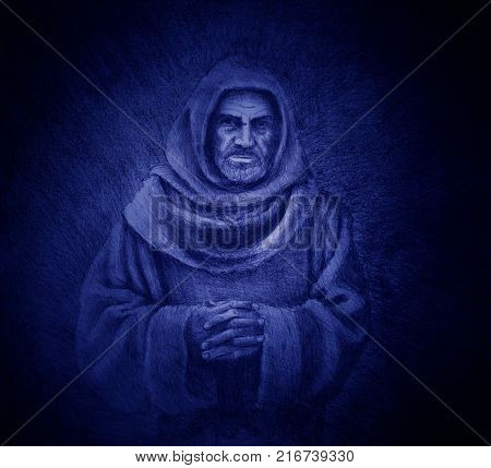 The Franciscan monk at the twilight recites a prayer