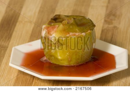 Maçã assada com calda de morango