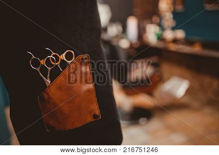 Barber shop. Close-up of barber tools for cutting hair in a male hairdresser. Baner copyspace