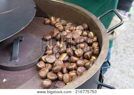 Bunch Of Roasted Chestnuts At Street Wendor. Christmas Market.