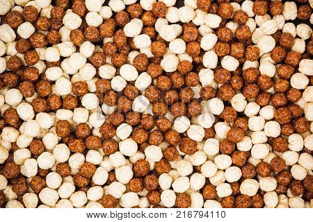 Chocolate Breakfast Cereal Texture. Cereal Balls As Background. Chocolate Corn Balls .