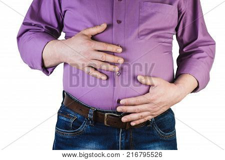Excess Body Weight Of A Man With His Hands Touching Fat On His Stomach Is The Concept Of Obesity. No