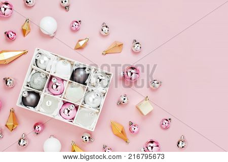 Stylish set of shiny christmas balls and gold crystals. Holiday concepts. Flat lay top view