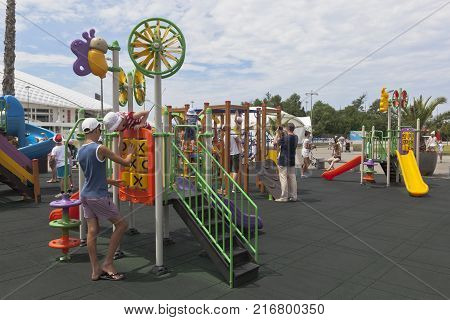 Adler, Krasnodar region, Russia - July 8, 2016: Children playing on playground in the Sochi Olympic Park