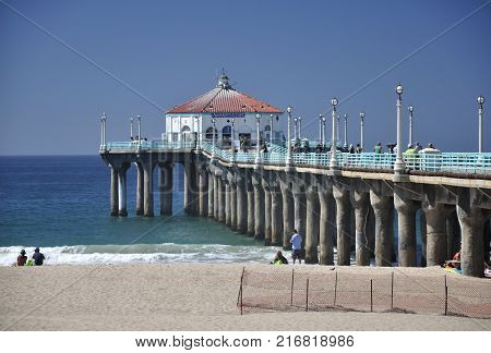 September 16 2016. Manhattan Beach California. People walking on the manhattan beach pier in Manhattan Beach California on the pacific ocean.
