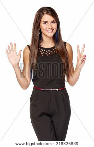 Hand counting seven fingers. Happy woman indicating the number seven with her fingers