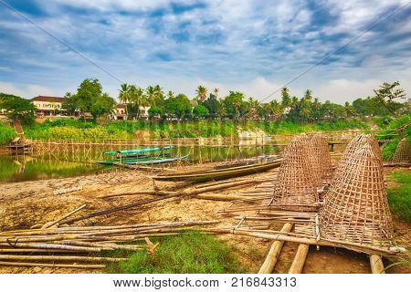 Beautiful view of a bamboo bridge. Luang Prabang. Laos landscape.