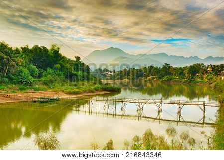 Beautiful view of a bamboo bridge. Luang Prabang. Laos landscape.