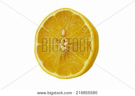 Yellow ripe sour lemon. The cut is sparkling with fresh juice. Inside the bones. Zest with dots. The background is white. Isolated.
