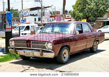 Acapulco Mexico - May 31 2017: Motor car Plymouth Valiant in the city street.