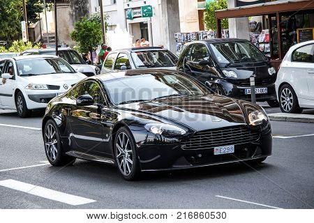 La Condamine Monaco - August 2 2014: Black sports car Aston Martin Vantage in the city street.