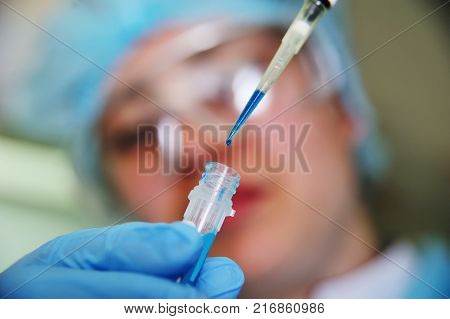 samples in PCR and DNA in a test tube for analysis