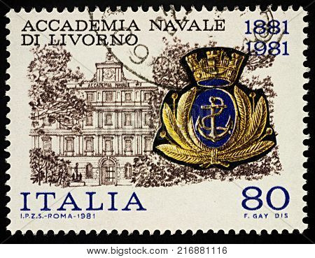 Moscow Russia - December 04 2017: A stamp printed in Italy shows Livorno Naval Academy and its emblem series "Livorno Naval Academy" circa 1981