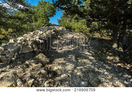 Stone trail ascent to the mountains of the Crimean peninsula