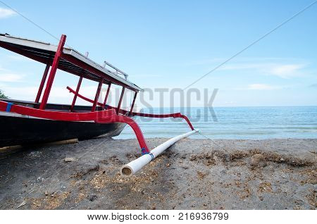 Traditional fishing boat trimaran in Bali, Indonesia. Stock image.
