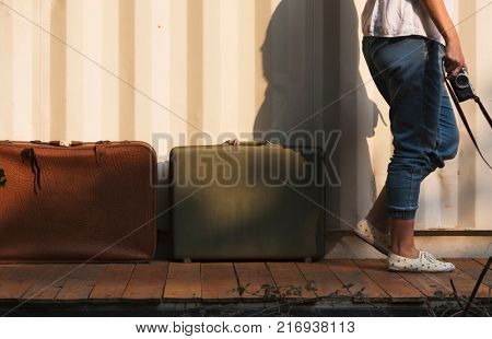 Woman traveler photographer holiday lifestyle trip