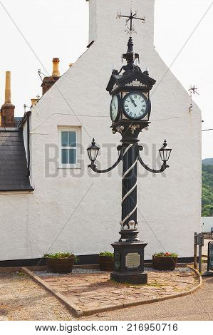 Historical street clock in Ullapool in Scotland. North west Scotland in United Kingdom.