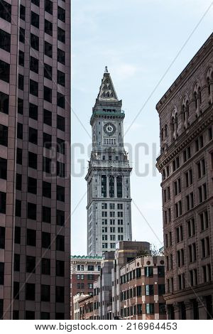 View of the historic Custom House skyscraper clock tower in skyline of Boston, Massachusetts USA