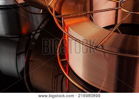copper cable factory, electric welding, on a black background