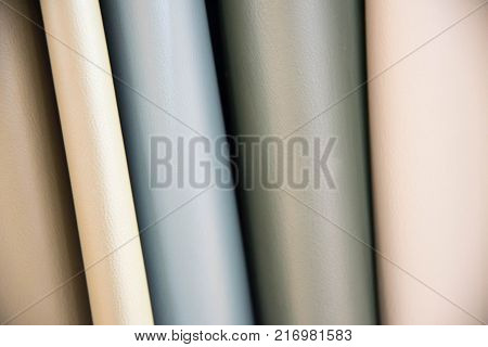 Color palette sample of leather material as a background.