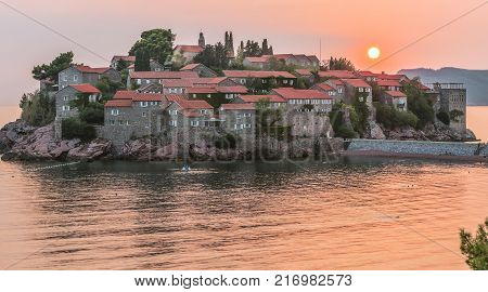 Beautiful view of the island-resort of St. Stephen (Sveti Stefan) at sunset, Budva, Montenegro.