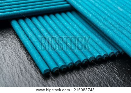 Electrodes for welding, on a black background