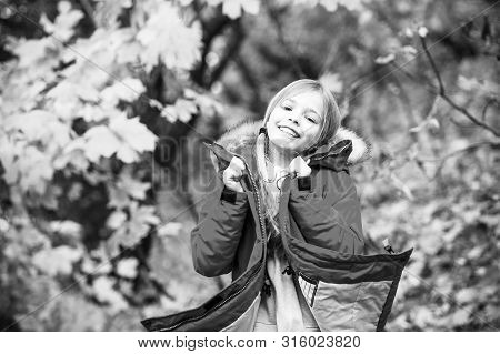 Feel So Cozy In Warm Jacket. Girl Happy In Coat Enjoy Fall Nature Park. Child Wear Fashionable Coat 