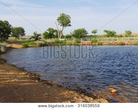 Medium Wide View Of Lake Elmer Thomas Near The Parking Lot At The Wichita Mountains, Oklahoma
