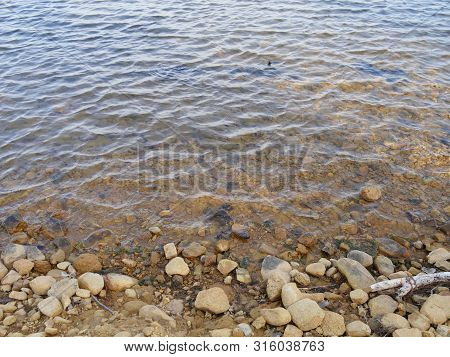 Close Up Of Water Rippling To The Shores Of Lake Elmer Thomas, Oklahoma