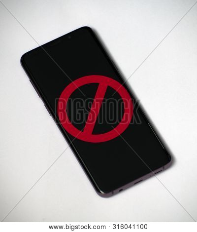 Red Prohibition Sign On The Smartphone Screen
