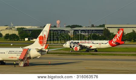 Bangkok, Thailand - Apr 24, 2018. Passenger Airplanes Taxiing On Runway Of Bangkok Don Muang Interna