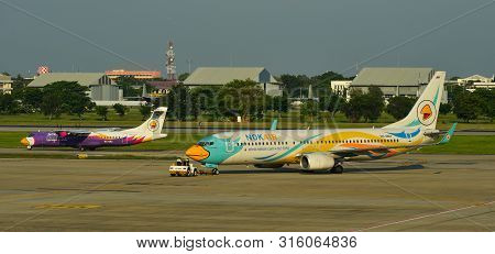 Bangkok, Thailand - Apr 24, 2018. Passenger Airplanes Taxiing On Runway Of Bangkok Don Muang Interna