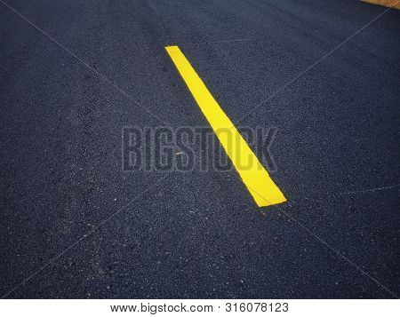 Road Traffic Paint On The Asphalt Surface And To Ensure Safety