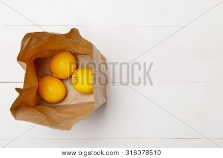 Brown Paper Bag From Top View Looking Down Inside At Bottom.