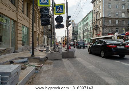 St. Petersburg, Russia - August 08, 2019: Repair Of Sidewalks On Bolshoi Prospect Of The Petrograd S