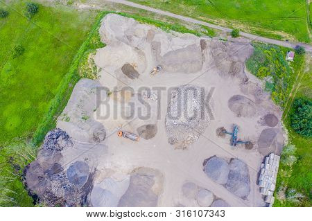 Aerial View Of Sandpit And Factory Plant Producing Sand Materials For Construction Industry. Top Vie
