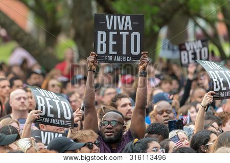 Houston, Texas - March 30, 2019: Supporter Holds Banner Beto For America During Beto Orourke Campaig