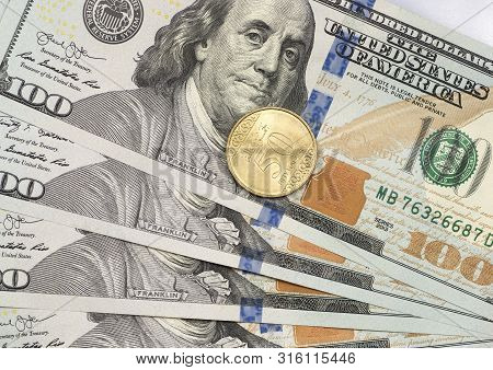 New 50 Halal Coin On Top Of Dollar Bills For Financial And Investment Concepts
