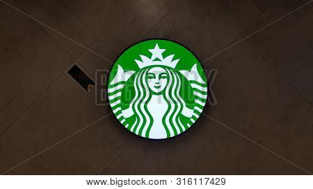 Bangkok, Thailand - August 19, 2019: Starbucks Mermaid Logo With The Modern Backround At Starbucks P