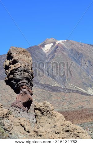 View Of Roque Cinchado With Mount Teide In The Background