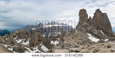Panoramic View Of Cir Peaks And Sella Massif On The Background. Dolomites, Italy