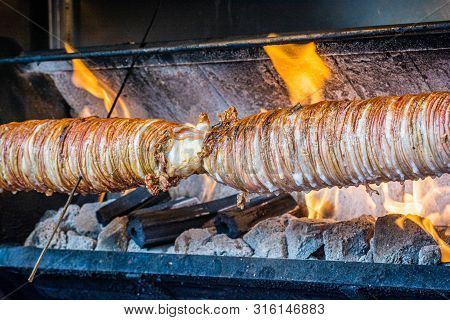 Turkish Traditional Food Kokorec Roasting On The Fire
