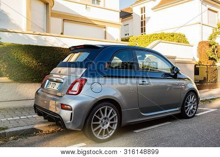 Strasbourg, France - Jul 29, 2018: Beautiful Light Blue Fiat 500 695 Rivale Mini Car Parked On A Fre