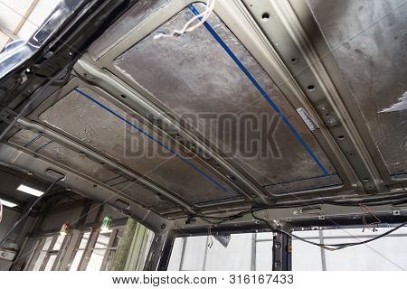 Tuning The Car In A Van Bus Body With Three Layers Of Noise Insulation On The Metal Roof. Sound And 